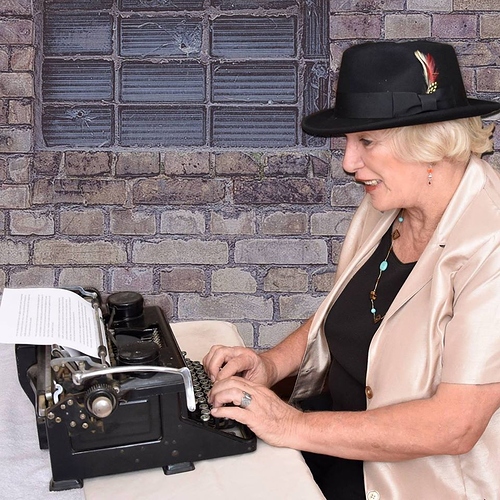 Pam on typewriter