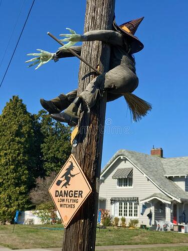 halloween-witch-dummy-straddles-telephone-pole-northeast-portland-oregon-halloween-witch-dummy-broom-straddles-telephone-240137596